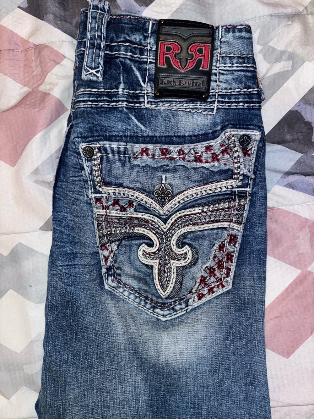 Rock Revival Men's Distressed Blue Jeans with Red Embroidered Pocket